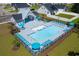 Community pool with plenty of lounge chairs and umbrellas for a relaxing outdoor experience at 899 Agostino Dr., Myrtle Beach, SC 29579