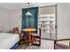 Balcony with patio chairs overlooking building, with curtains visible in bedroom at 9550 Shore Dr. # 1511, Myrtle Beach, SC 29572