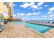 Resort-style oceanfront pool with lounge chairs for relaxing and soaking up the sun at 9550 Shore Dr. # 1511, Myrtle Beach, SC 29572