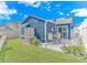 Backyard features a patio, grill, seating and beautiful landscaping and manicured lawn at 1006 Charles St., North Myrtle Beach, SC 29582