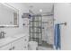 Modern bathroom featuring a glass-enclosed shower, sleek vanity, and stylish tile accents at 1006 Charles St., North Myrtle Beach, SC 29582
