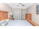 Charming bedroom with wooden furniture, a ceiling fan, and a door to the outside at 1006 Charles St., North Myrtle Beach, SC 29582
