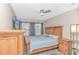Comfortable bedroom with wooden furniture, ceiling fan, and a serene ambiance at 1006 Charles St., North Myrtle Beach, SC 29582