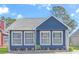 Lovely home showcasing a cozy design and manicured front yard landscaping at 1006 Charles St., North Myrtle Beach, SC 29582