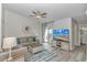 Bright living room with a comfortable sofa, stylish decor, and sliding glass doors at 1006 Charles St., North Myrtle Beach, SC 29582