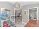 Functional office space with a comfortable chair, desk, and stylish decor throughout the room at 1006 Charles St., North Myrtle Beach, SC 29582