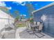 Outdoor patio area with dining table and grill, perfect for entertaining at 1006 Charles St., North Myrtle Beach, SC 29582