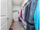 Walk-in closet, equipped with rods and shelves for organized storage of clothing and shoes at 10141 Hamilton Branch Loop, Myrtle Beach, SC 29579