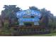 The Myrtle Beach welcome sign surrounded by vibrant flowers, bushes and trees creates a warm welcome to the city at 10141 Hamilton Branch Loop, Myrtle Beach, SC 29579