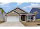 Charming single-Gathering home featuring a two-car garage and beautiful landscaping in a desirable neighborhood at 10141 Hamilton Branch Loop, Myrtle Beach, SC 29579