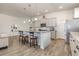 Gourmet kitchen featuring a granite countertop island with pendant lighting at 10141 Hamilton Branch Loop, Myrtle Beach, SC 29579