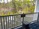 Balcony overlooking a scenic lake with a fountain, offering a tranquil outdoor living space at 1024 Ray Costin Way # Villa 711, Murrells Inlet, SC 29576