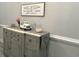 A decorative table with modern accents and art in a well-lit room at 1024 Ray Costin Way # Villa 711, Murrells Inlet, SC 29576