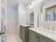 Dual vanity bathroom with stylish cabinets, mirrors and coastal accents at 108 Cole Dr., Pawleys Island, SC 29585