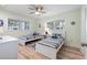 Charming bedroom with twin beds, coastal decor, and plenty of natural light at 108 Cole Dr., Pawleys Island, SC 29585
