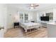 Inviting bedroom with a metal frame bed, two windows and beach decor at 108 Cole Dr., Pawleys Island, SC 29585