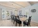Dining room featuring a rustic table and chair set, wood floors, and a decorative chandelier at 108 Cole Dr., Pawleys Island, SC 29585