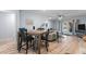 Open-concept living room and dining area with modern furniture and stylish decor at 108 Cole Dr., Pawleys Island, SC 29585