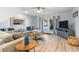 Cozy living room featuring a comfortable sectional sofa, ceiling fan, and a TV at 108 Cole Dr., Pawleys Island, SC 29585