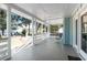 Inviting front porch with swing and chairs, perfect for enjoying the outdoors at 108 Cole Dr., Pawleys Island, SC 29585