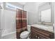 Cozy bathroom including a shower-tub combo, sink with wooden vanity, and neutral color scheme at 108 Silver Peak Dr., Conway, SC 29526