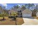 Charming single-Gathering home with a well-manicured lawn and a two-car garage at 108 Silver Peak Dr., Conway, SC 29526