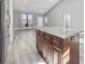 Open-concept kitchen featuring a large island with stone countertop and spacious living area at 108 Silver Peak Dr., Conway, SC 29526