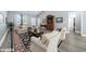 Comfortable living room features neutral paint, wood floors, and lots of natural light at 108 Silver Peak Dr., Conway, SC 29526