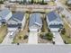 Aerial view of the houses showing the layout and backyard features of each property in the community at 1097 Balmore Dr., Myrtle Beach, SC 29579