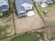 Aerial view showing backyard features like patios, play equipment, and landscaping within a fenced yard at 1097 Balmore Dr., Myrtle Beach, SC 29579