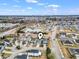 Aerial view of the neighborhood showcasing the layout, nearby pond, and the property's prime location at 1097 Balmore Dr., Myrtle Beach, SC 29579