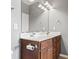Bathroom featuring a double sink vanity with dark wood cabinets and a large mirror at 1097 Balmore Dr., Myrtle Beach, SC 29579