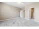 Bedroom with neutral walls, plush carpeting, a ceiling fan, and an en-suite bathroom at 1097 Balmore Dr., Myrtle Beach, SC 29579