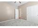 Carpeted bedroom featuring a closet and neutral color scheme with an open door at 1097 Balmore Dr., Myrtle Beach, SC 29579