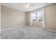 Bedroom featuring neutral walls, carpeted floors, a ceiling fan, and plenty of natural light at 1097 Balmore Dr., Myrtle Beach, SC 29579