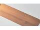 A close-up shot of a wood ceiling fan blade at 1097 Balmore Dr., Myrtle Beach, SC 29579