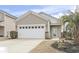Charming home featuring a two-car garage, inviting curb appeal, and well-maintained landscaping at 1097 Balmore Dr., Myrtle Beach, SC 29579