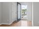 Bright foyer with hardwood floors, open doorway, and natural light streaming through the front door at 1097 Balmore Dr., Myrtle Beach, SC 29579