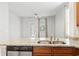 Bright kitchen featuring granite countertops, stainless steel appliances, and modern sink fixture at 1097 Balmore Dr., Myrtle Beach, SC 29579