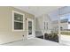Screened porch with outdoor access and view of the home's exterior at 1097 Balmore Dr., Myrtle Beach, SC 29579