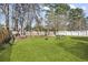 Expansive backyard featuring well-maintained lawn, fencing, and landscaping at 11 Ryan Ln., Myrtle Beach, SC 29579