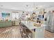 Well-equipped kitchen with island and seating, stainless steel appliances, and hardwood floors at 11 Ryan Ln., Myrtle Beach, SC 29579