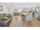 Spacious open floor plan connects the kitchen with the living area and features hardwood floors throughout at 11 Ryan Ln., Myrtle Beach, SC 29579