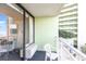 Relax on this private balcony overlooking a beautiful courtyard, a serene retreat for enjoying fresh air at 1105 S Ocean Blvd. # 446, Myrtle Beach, SC 29577