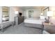 Comfortable bedroom with a neatly made bed, dresser with TV, soft lighting, and neutral decor at 1105 S Ocean Blvd. # 446, Myrtle Beach, SC 29577