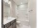 Bright bathroom with tub-shower combination and undermount sink at 1110 N Middleton Dr. Nw, Calabash, NC 28467