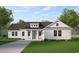 Charming home featuring board and batten siding, inviting front porch with chairs, and well-manicured lawn at 1110 N Middleton Dr. Nw, Calabash, NC 28467