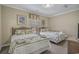 Charming bedroom with two twin beds, decorative bedding, and ample natural light at 113B 13Th Ave. N, Surfside Beach, SC 29575