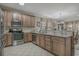 Spacious kitchen featuring stainless steel appliances, ample counter space and a breakfast bar at 113B 13Th Ave. N, Surfside Beach, SC 29575