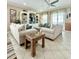 Inviting living room featuring tile floors, comfortable seating, and a decorative entertainment center at 113B 13Th Ave. N, Surfside Beach, SC 29575